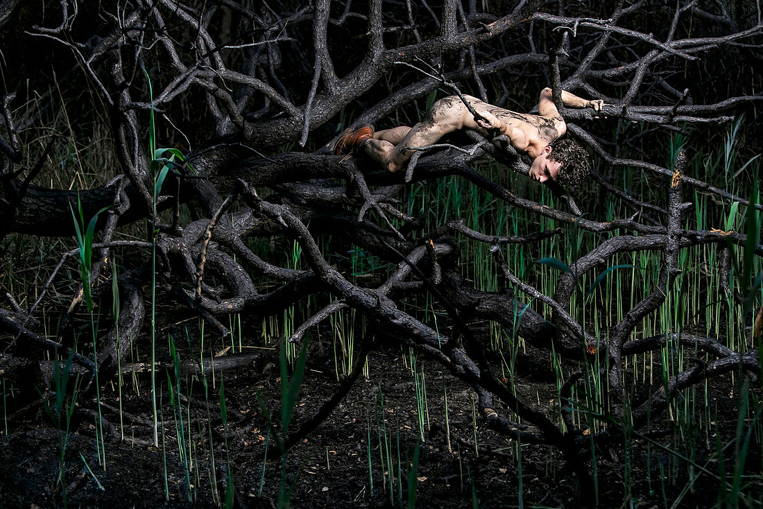 Figure emerging from the ashes in the burnt section of the Meat Rack on Fire Island, photographed by koitz
