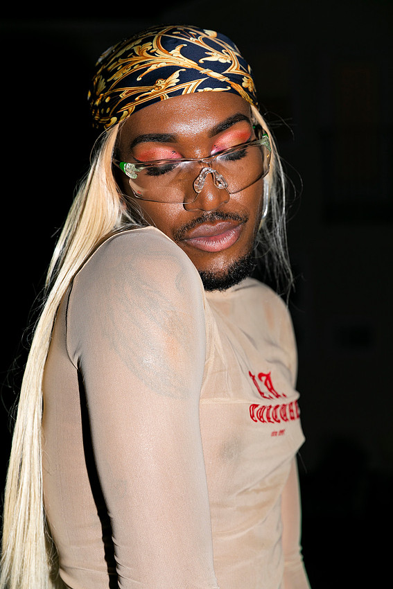 Person dressed up and enjoying a party in Cherry Grove, photographed by koitz