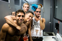Men gathered in a bathroom on Fire Island, New York