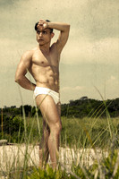 Model posing in the sand dunes of Fire Island, photographed by koitz.