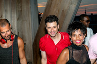 koitz with DJ Greg Scarnici and singer and actress Melba Moore at a Fire Island event, photographed by Robert Bonanno in 2014.