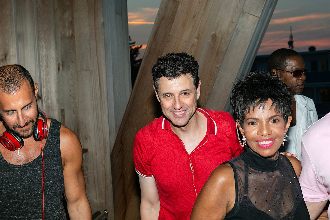 koitz with DJ Greg Scarnici and singer and actress Melba Moore at a Fire Island event, photographed by Robert Bonanno in 2014.