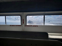 Fire Island ferry photographed from another ferry during the journey, by koitz Photography.