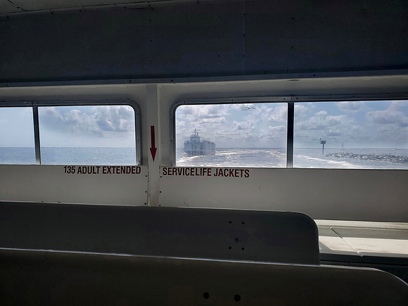 Fire Island ferry photographed from another ferry during the journey, by koitz Photography.