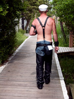 leather guy on boardwalk in Cherry Grove, Fire Island
