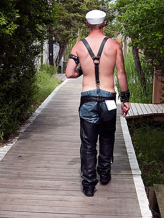 leather guy on boardwalk in Cherry Grove, Fire Island