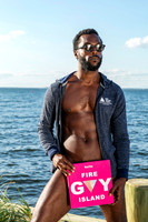 Model holding photo book koitz Gay Fire Island