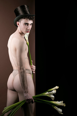 Fine art photograph titled The Dance and the Calla Lilies, featuring a symbolic composition inspired by queer identity and contemporary artistic expression.