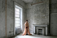 Brock wearing a dress at the Brooklyn Navy Yard in New York City.