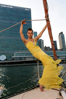 Brock dressed in drag and posing as a piece of furniture, photographed by koitz.