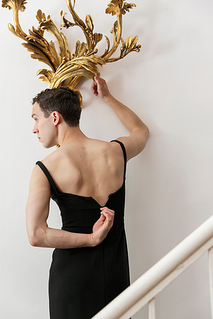 Brock wearing a dress unzipping, photographed by koitz.