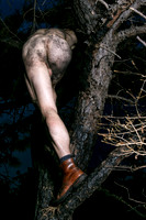 Brock exploring the burnt landscape of the Meat Rack on Fire Island in boots, photographed by koitz.