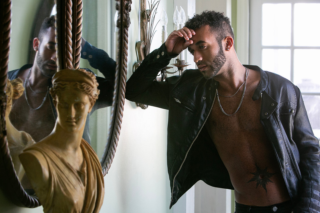 Calvin reflected in the mirror inside the Belvedere Guest House for Men on Fire Island | koitz