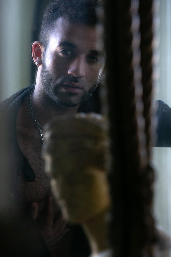 CU Calvin reflected in the mirror inside the Belvedere Guest House for Men on Fire Island | koitz